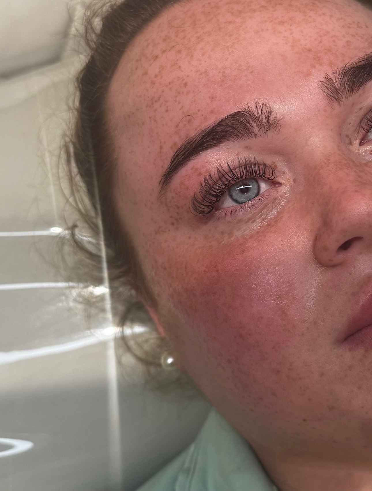 Angel lash extensions with a soft fluttery curl and brushed-up brow, created at Dolls Beauty Room in Shirley, Southampton