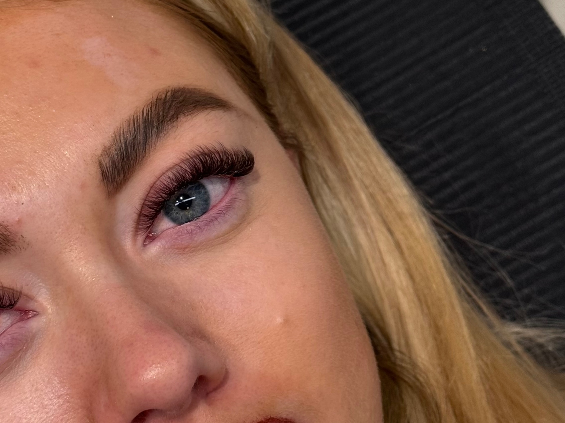 Brown hybrid lash extensions with a soft lifted curl, created in Shirley, Southampton