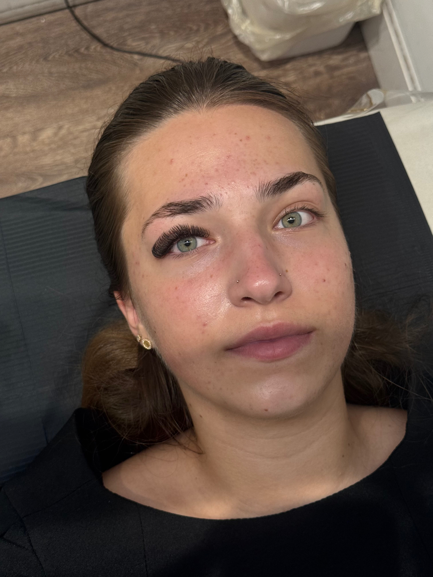 Close-up of wispy lash extensions and laminated brows created in Shirley, Southampton