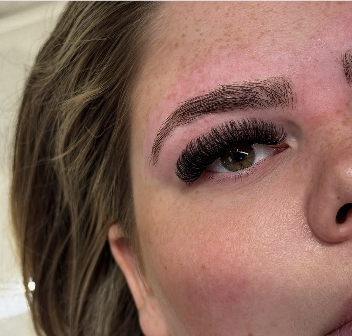 Dark, dense Russian volume lash extensions with a groomed brow, created at Dolls Beauty Room in Shirley, Southampton